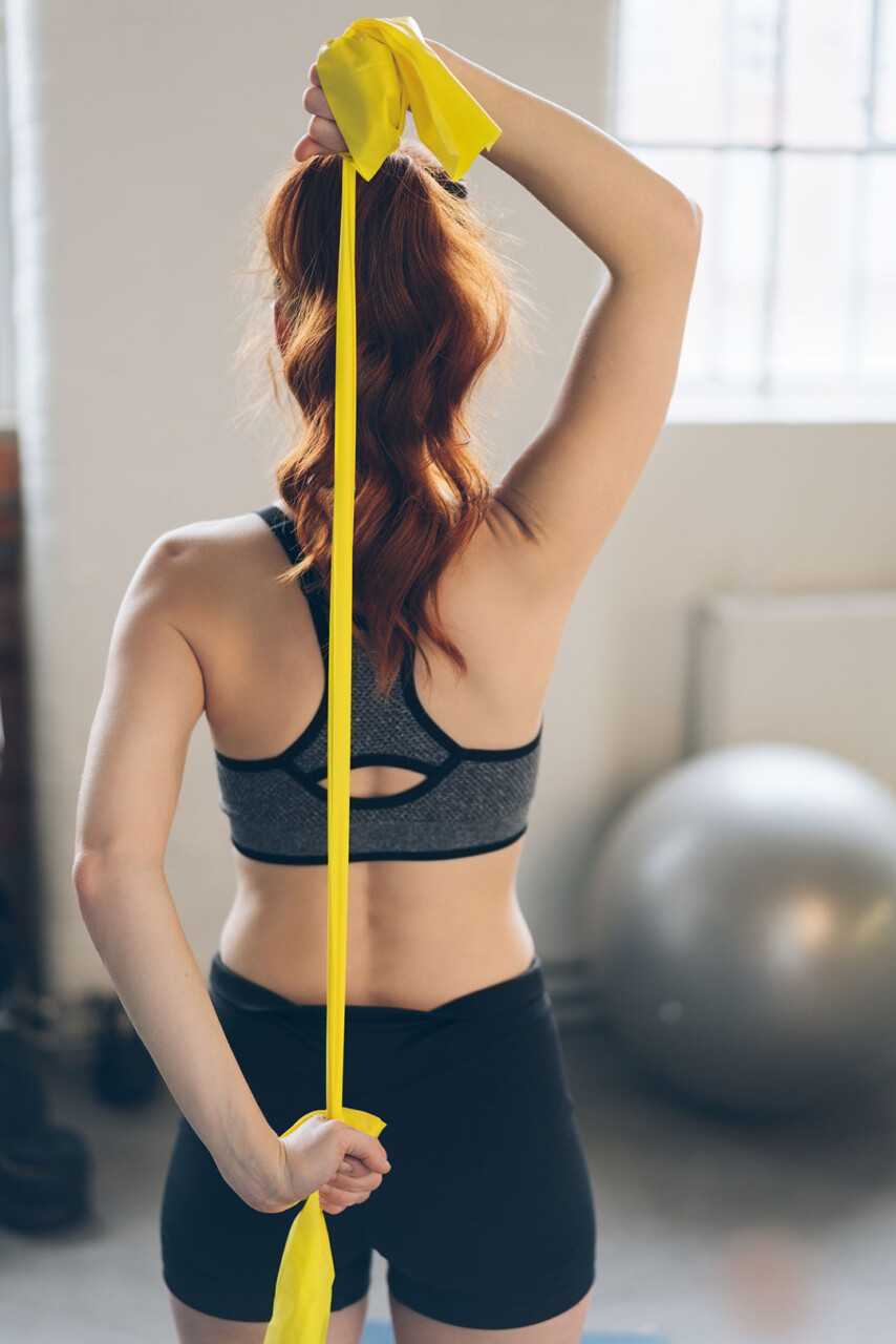 Woman Doing Therapeutic Physiotherapy Exercise